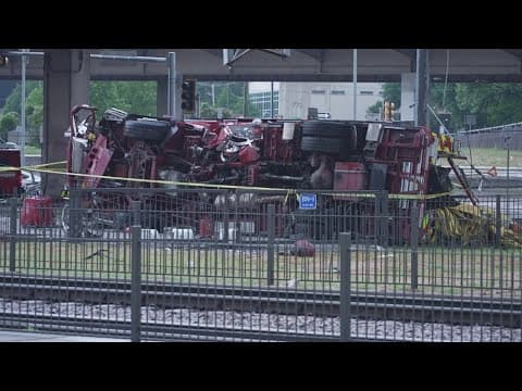 Dallas fire truck falls off interstate and crashes into rail lines below