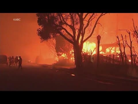 Wildfires rage in heavily populated areas in Southern California