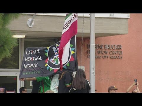 Latinx flag flying outside San Diego Unified Headquarters for the first time