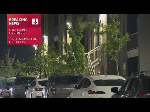 Woman shoots another woman in the back while she was holding a child - fires at police