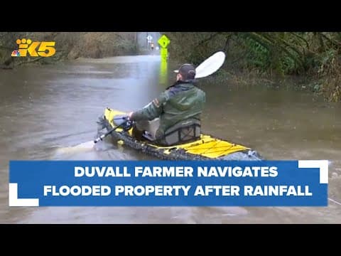 Duvall farmer navigates flooded farm after historic rainfall