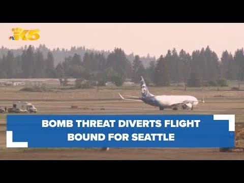 Man in custody after making bomb threat aboard plane bound for Seattle