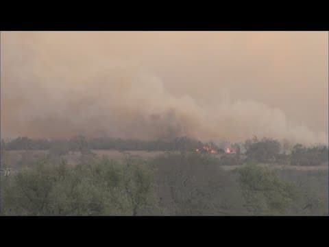 Fire crews continue to battle 9,500-acre wildfire near Fredericksburg