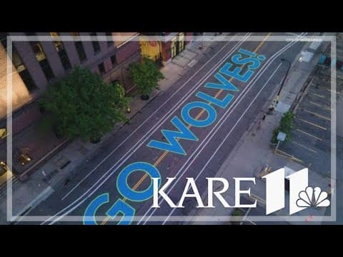 Minneapolis city officials paint the town blue and green to celebrate Wolves' postseason run