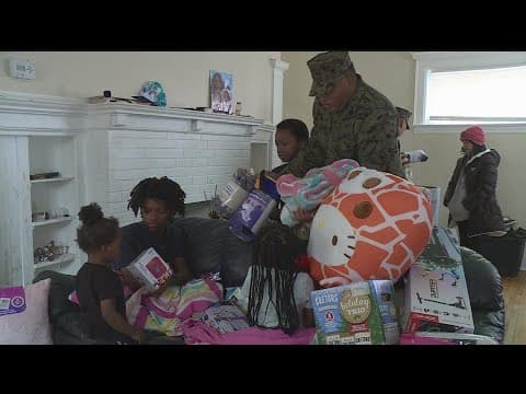 'Toys for Tots' volunteers pack and distribute hundreds of toys for the holidays