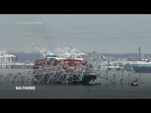 Baltimore bridge collapses after powerless cargo ship rams into support column