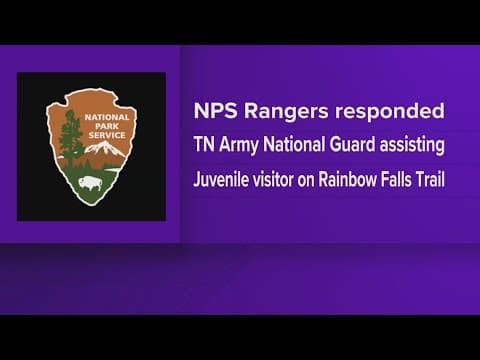 NPS rangers rescuing visitor on trail in GSMNP