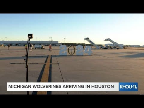 Michigan Wolverines arriving in Houston for the college football championship