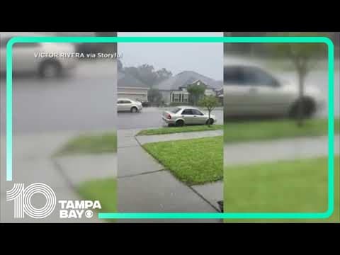 Hail stones fall on cars and homes in Groveland, Florida