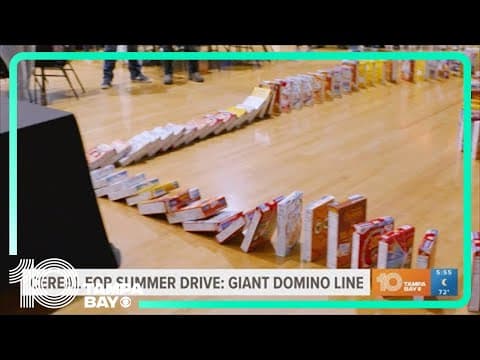 Giant domino line of cereal boxes falls to celebrate Cereal for Summer