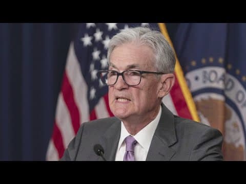 Fed holds rates steady, signals possible cuts