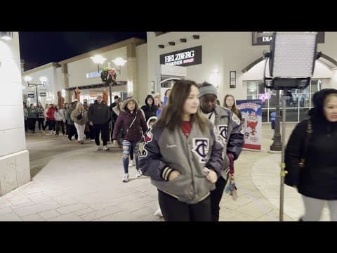 Black Friday shoppers line up around Lululemon at Tanger Outlets in Fort Worth