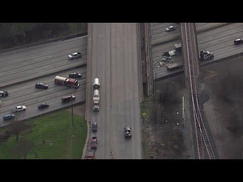 Big rig hits overpass on East loop at Clinton Drive, stalling traffic