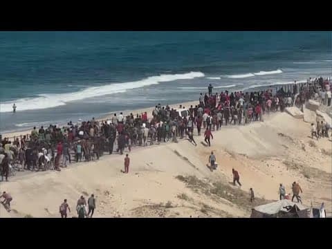 Droves of men, women, children seen along coastal road as ceasefire in Gaza takes effect