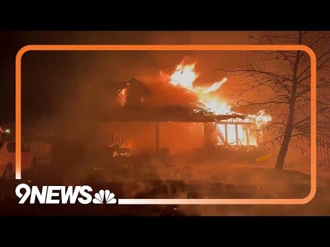 Firefighters attempt to save California neighborhood from fire