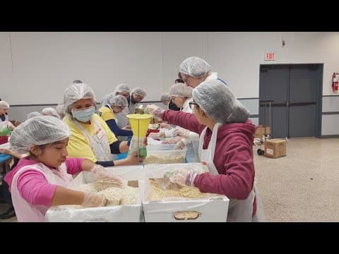 Volunteers package over 18,000 oatmeal servings to warm neighbors hearts | Get Uplifted