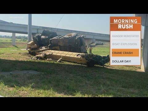 A construction crane falls off an overpass, closing highway