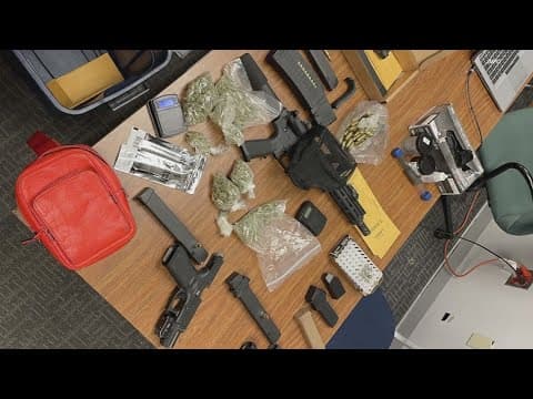 Two arrested in gun and drug bust during traffic stop