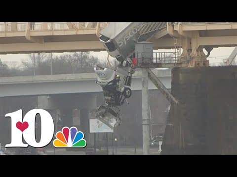 Semi truck hanging off Clark Memorial Bridge in Kentucky