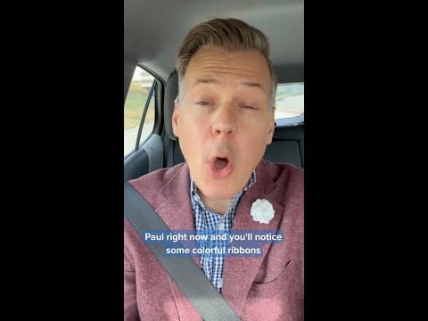 Green and blue ribbons adorned the TC Marathon route Sunday to honor Annunciation shooting victims.