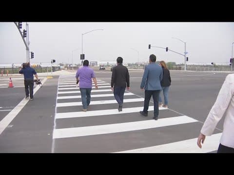 Officials celebrate the completion of major cross-border infrastructure improvements