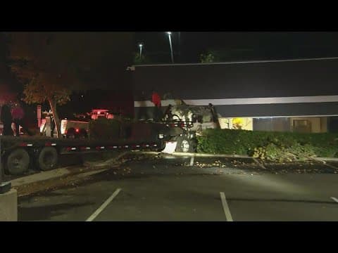 Unoccupied semi crashes into hydrant and building in Sorrento Valley