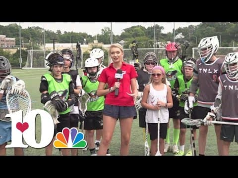 Katie having a field day with young lacrosse players