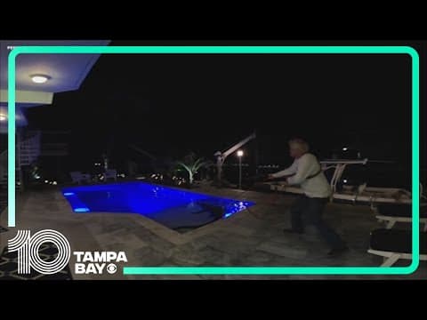 Massive American crocodile wrestled out of Florida swimming pool