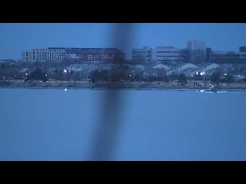 Divers continue to perform recovery operations from plane crash as crews lose daylight in DC