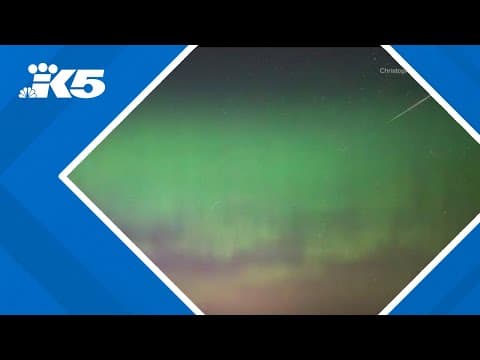 Photographer captures image of meteor during northern lights