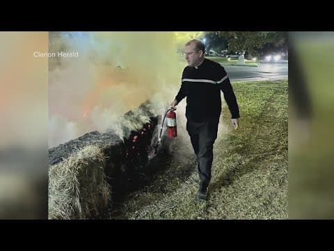 Priest puts out fire at Archdiocese's nativity scene display