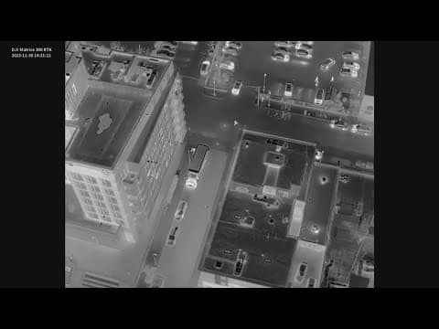 Newly released video shows police using drone to help catch suspects