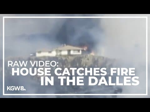 Flames seen on home as fire burns in The Dalles, Oregon