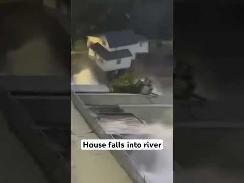 House falls into river after dam partially fails #severeweather