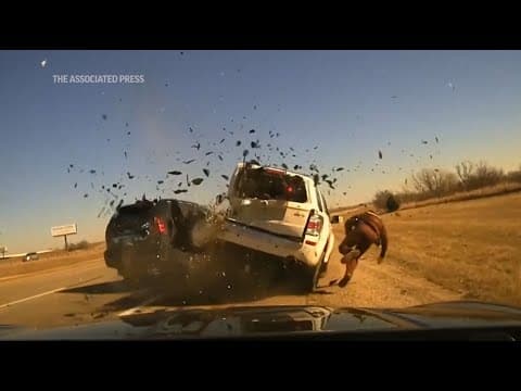 Oklahoma trooper thrown to ground as vehicle on interstate hits SUV he pulled over