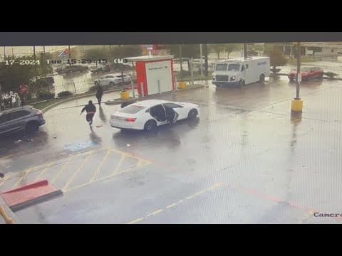 Surveillance video captures what Houston police say is an armored truck robbery