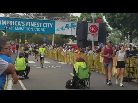 People who experienced homelessness participate in America's Finest City Half-Marathon