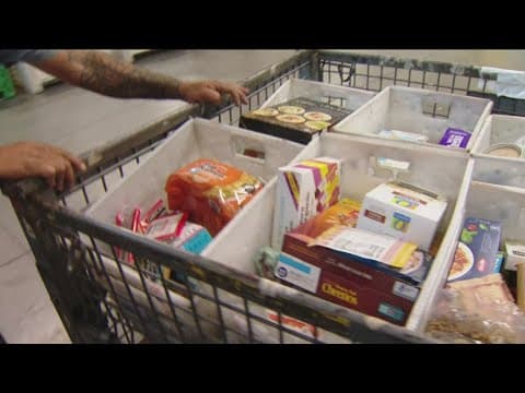 Letter carriers collect donations for annual Stamp Out Hunger Food Drive