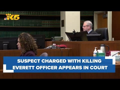 Suspect charged with shooting, running over Everett police officer appears in court