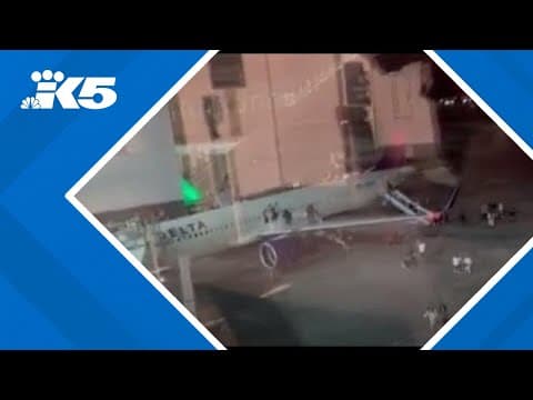 Nose of Delta plane briefly catches fire at SEA Airport
