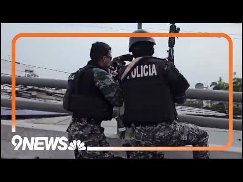 Police outside tv station after attack in Ecuador