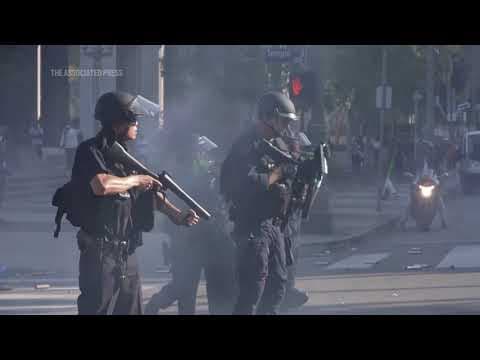 Law enforcement in Los Angeles uses tear gas, rubber bullets and flash bangs to control protests
