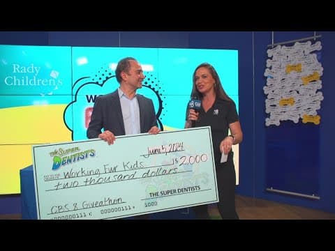 The Super Dentists makes a donation to Rady Children's for new Resident Canine Therapy Program