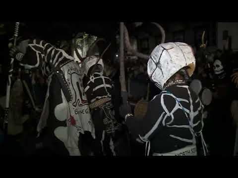 Skull & Bone gang walks up Treme with their chants and drum beats