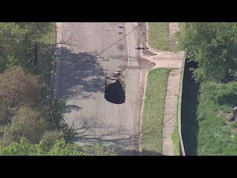 Truck gets stuck in sinkhole on Dallas road after wastewater pipe breaks
