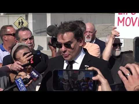 Former US Rep George Santos talks to reporters after guilty plea in fraud case