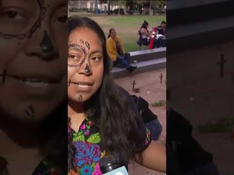 Family members honor the dead at Día de Los Muertos celebrations in San Diego