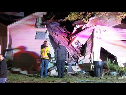 Raw video: Car flips into detached garage in Cypress, Texas