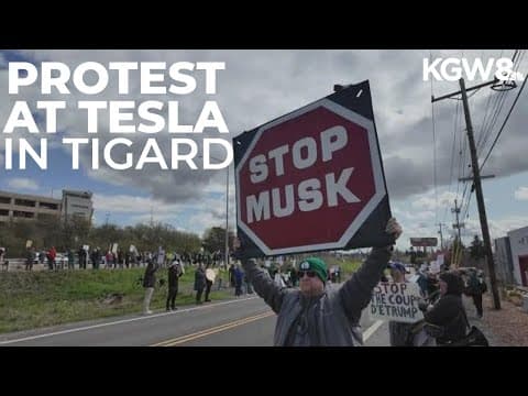 Protesters hold rally outside Tesla store in Tigard