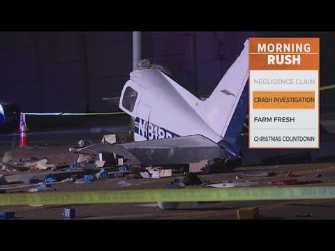 Plane crashes into intersection, injuring four people